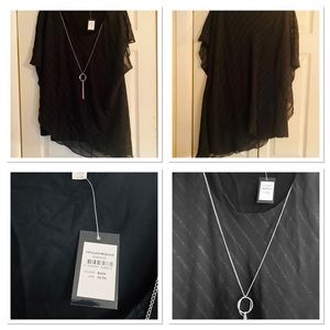 Pretty NWT Asymmetrical black top.